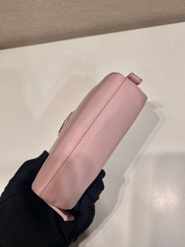 Pra*a clutch bags